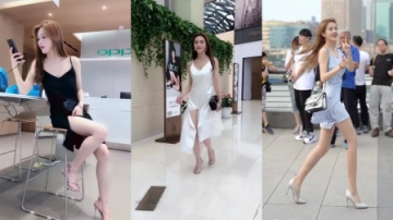 美女街拍：气质美女穿短裙逛街，大长腿一览无余